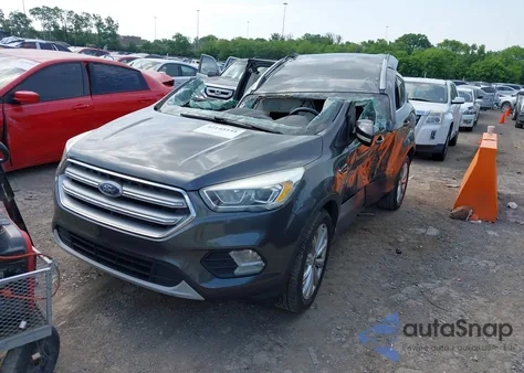 2017 Ford Escape Titanium z USA, uszkodzony, nr VIN 1FMCU0JD3HUA57747